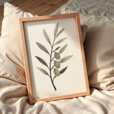 olive-branch-art-frame-on-the-bed